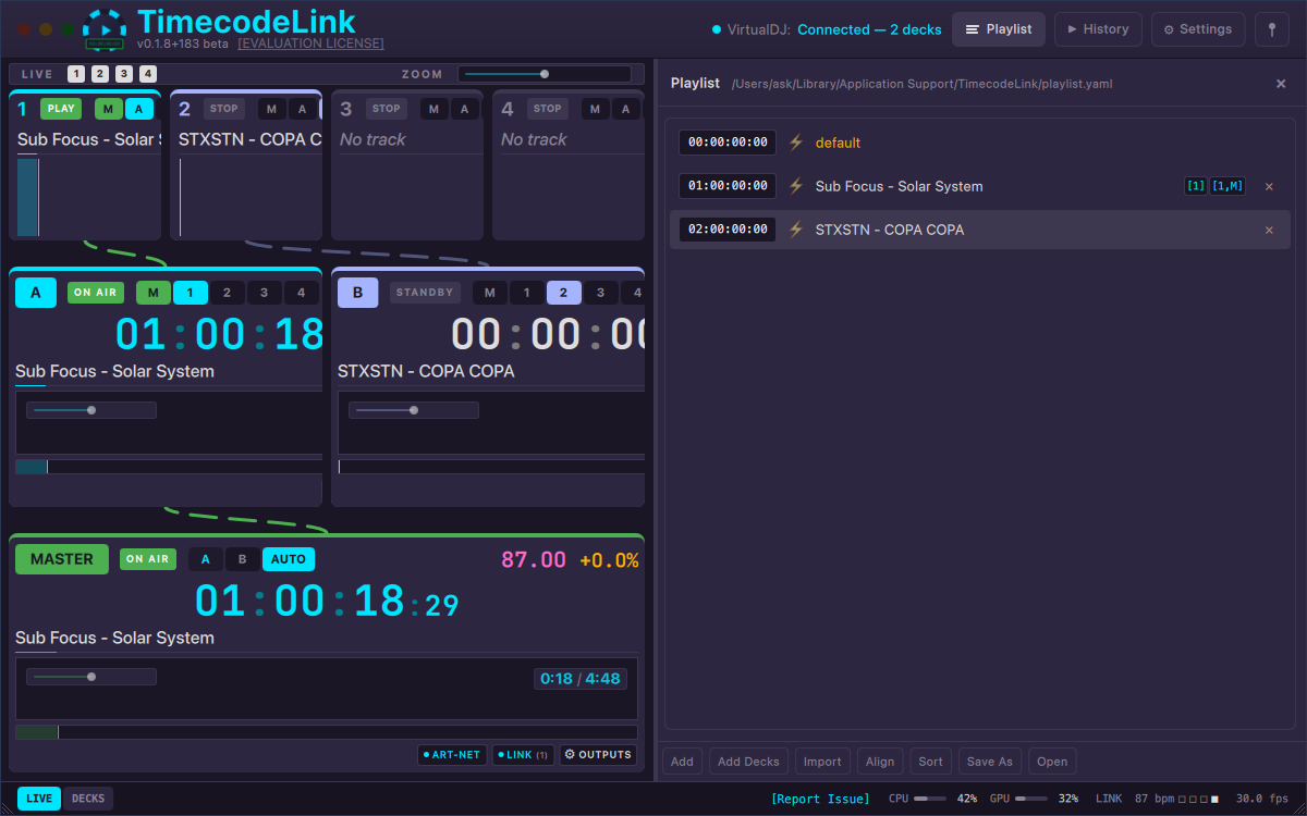 TimecodeLink playing the first song at 01:00:18:29, with the playlist showing songs at 01:00:00:00 and 02:00:00:00